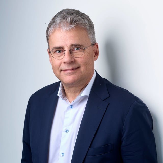 Man pictured in a suit