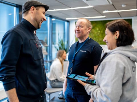 People talking in an office environment.