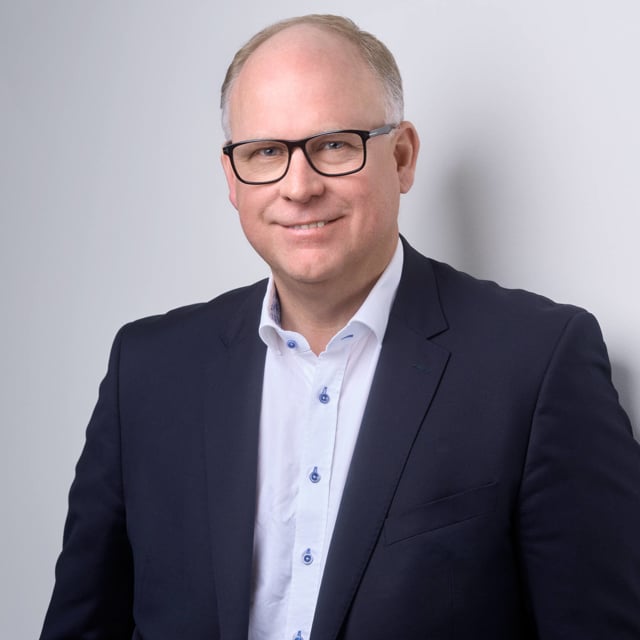 Dark green person icon on a lightgreen background