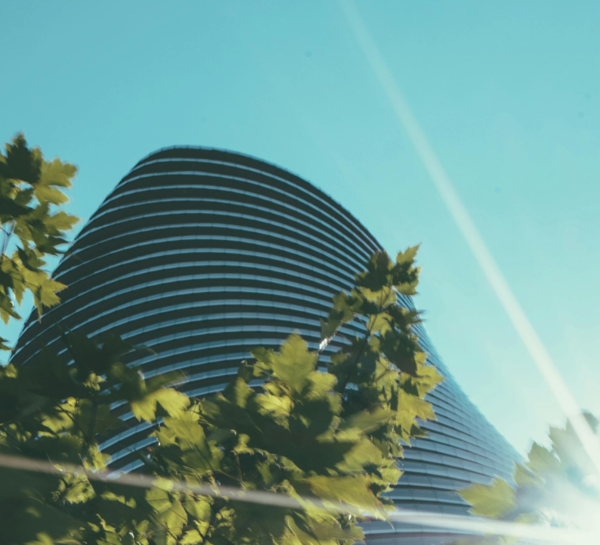 A modern building against a grey sky